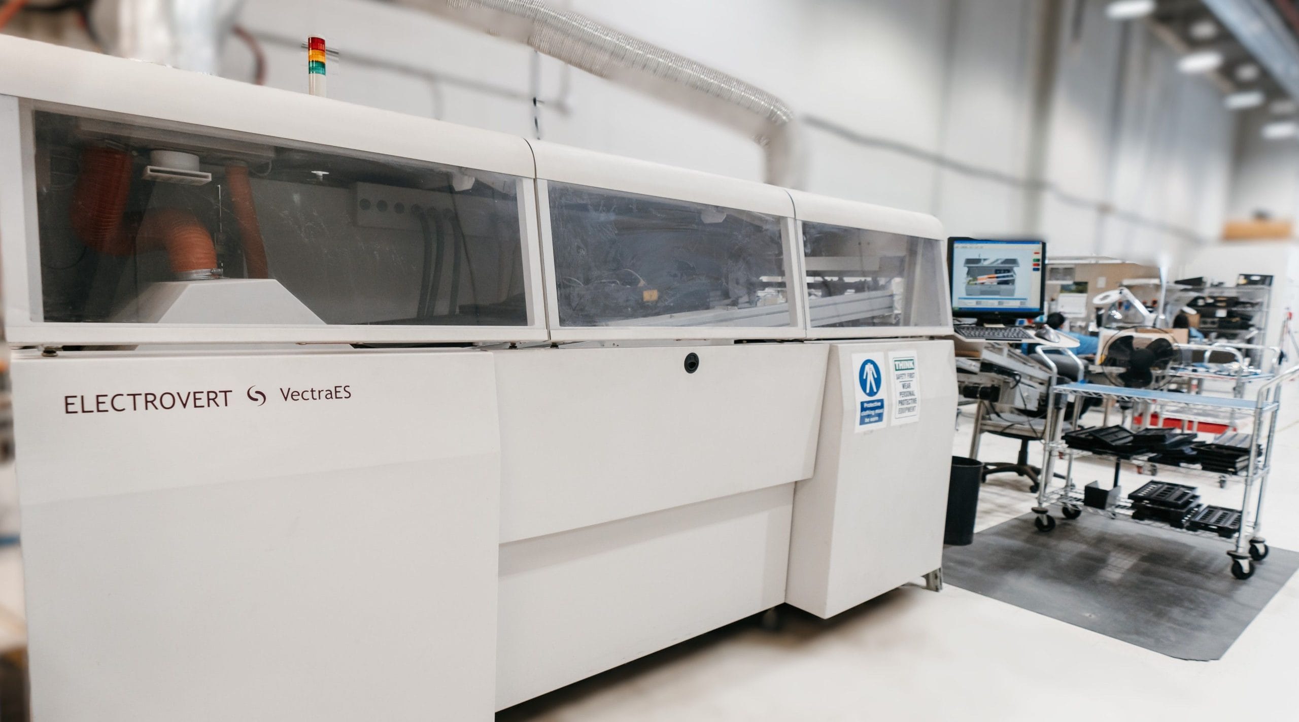 Electrovert VectraES lead free wave solder machine used for through hole PCB assembly in IMS’s Calgary-based electronics manufacturing facility.